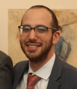 Tal Abraham Ben-Moshe ’21 with beard and glasses and jacket and tie