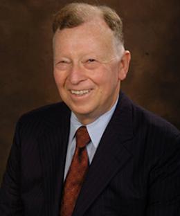 Portrait of a man with a red tie