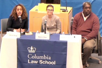 Three spekers at a table for a 1619 panel discussion at Columbia Law School