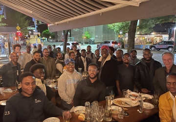 Law students of the Black Mens Initiative gather at a restaurant