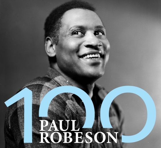 Black and white photo of Paul Robeson with text that says Paul Robeson 100