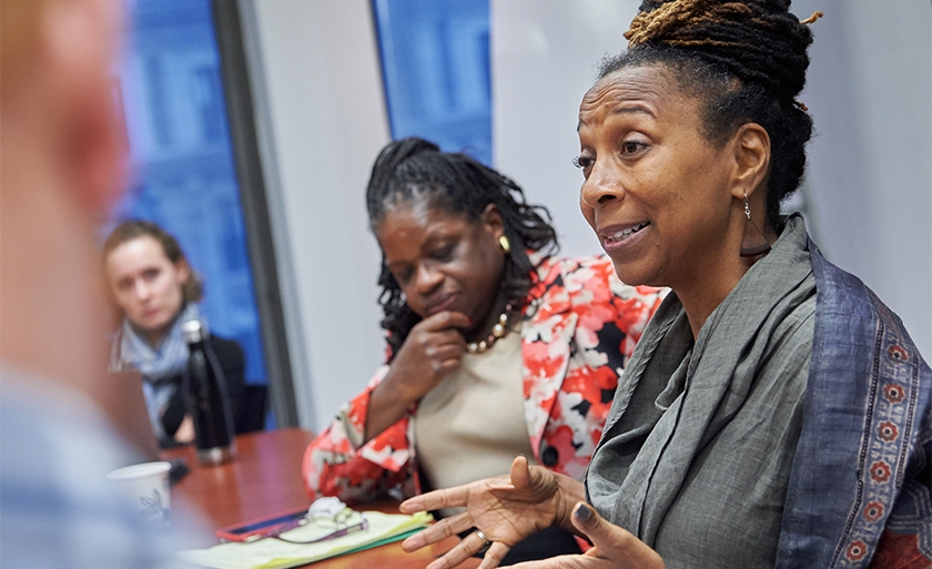 Professor Kimberlé Crenshaw teaching in a conference room.