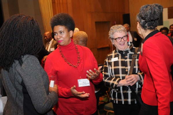 Attendees socialize at the 2016 Alumni of Color reception