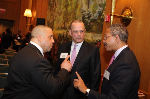 George Madison speaks with other attendees at the 2016 Alumni of Color reception