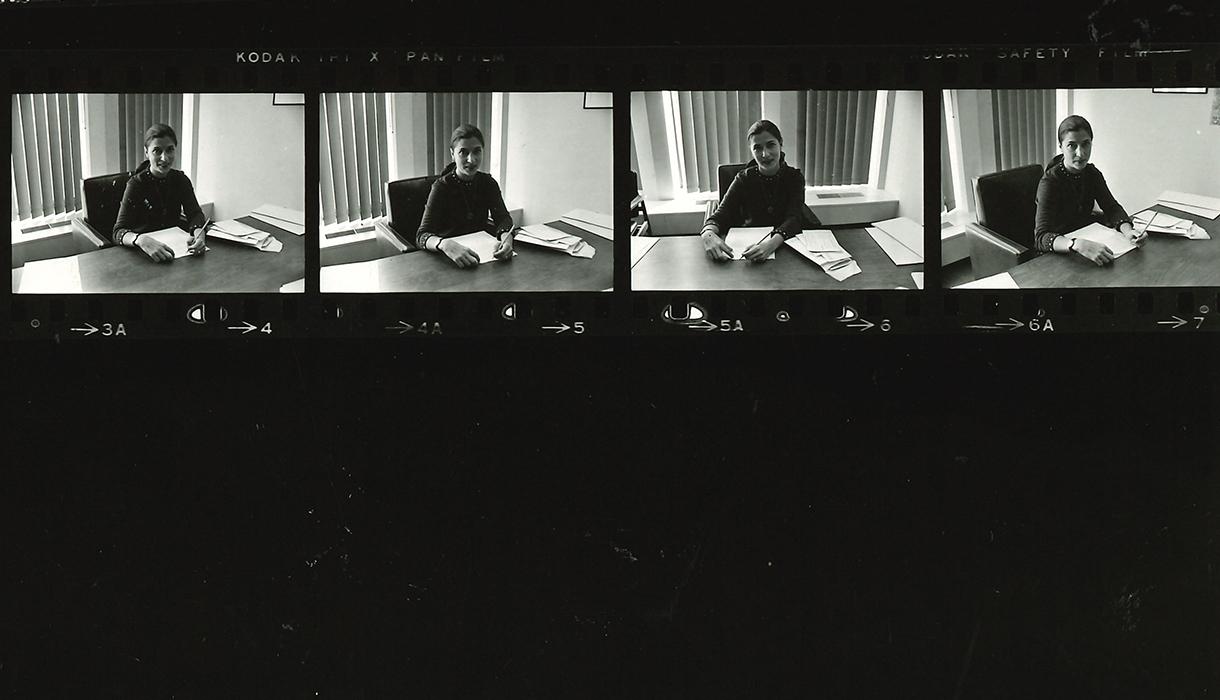 Ruth Bader Ginsburg sits at her desk as a professor in the 1970s.