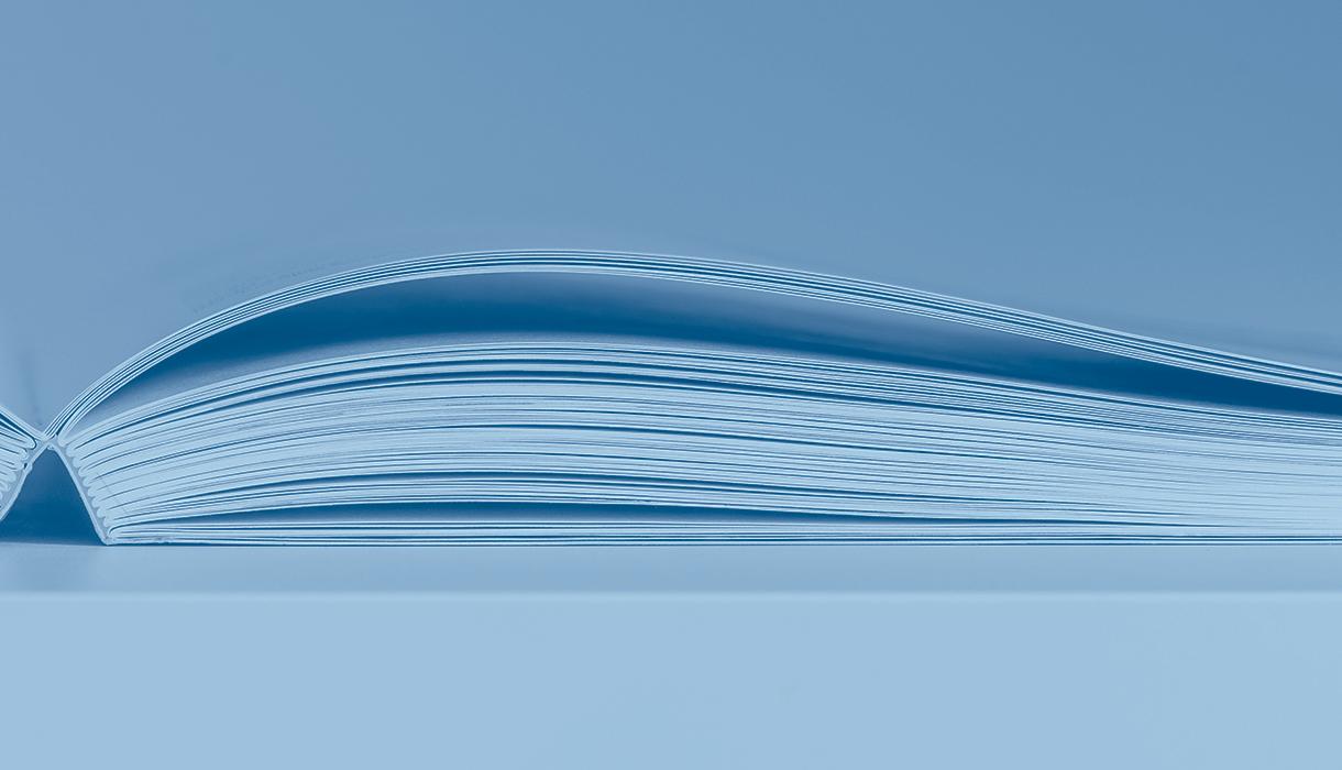 Blue image of an open book