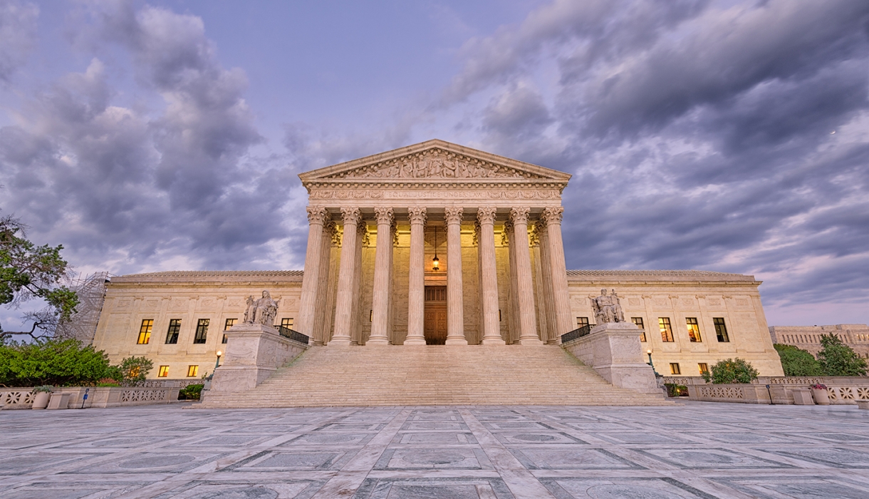 Photo of the U.S. Supreme Court Building at dusk