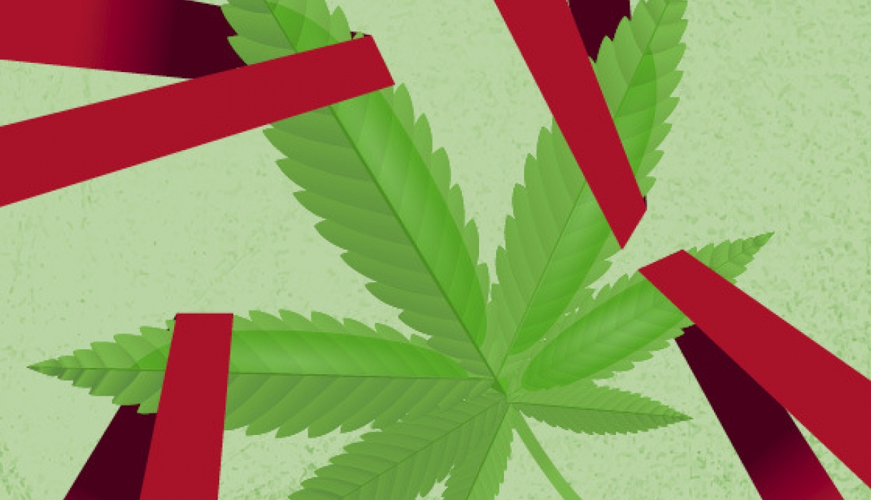 A marijuana leaf wrapped in red tape