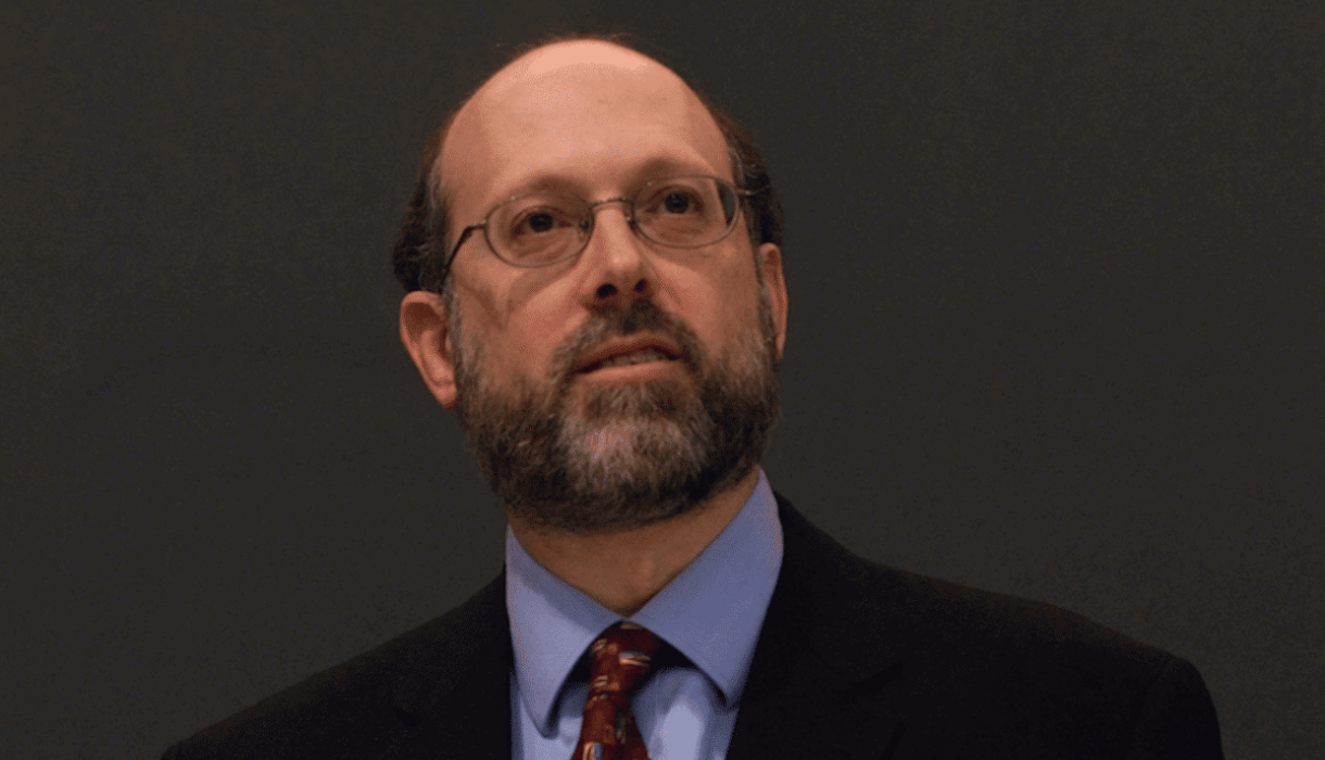 Man with beard in glasses and tie and jacket