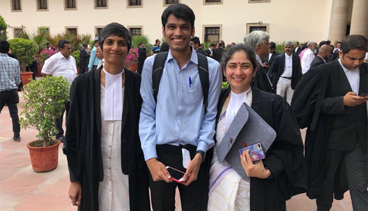 Menaka Guruswamy, Kumar Vardhman (petitioner), and Arundhati Katju ’17 LL.M. before oral arguments in July.