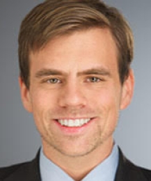 Headshot of Alex Hogan