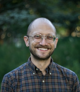 Man in glasses and plaid shirt