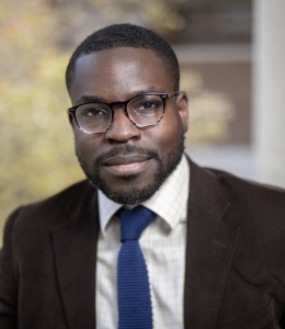 Man in glasses and suit and tie