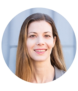 Jessica Bulman-Pozen, a smiling professor wearing a grey jacket.