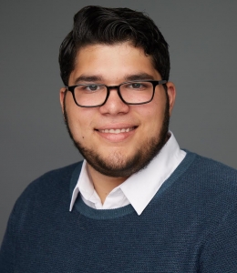 Bastian Shah ’21 in glasses and shirt with white collar