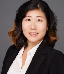 Grace Choi ’21 in white blouse and dark jacket