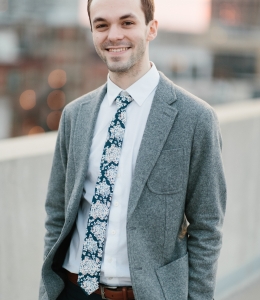 Stephen M. Hogan-Mitchell in tie and gray jacket