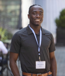 Maxwell Edwards smiling at Orientation