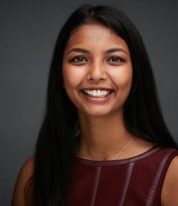 Smiling woman with long black hair