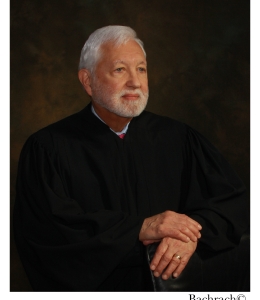 Picture of a man in judge's robes