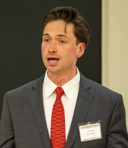 Conor Regan speaking at HFS Moot Court semi-finals