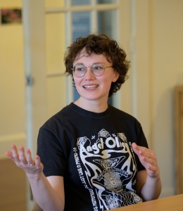 Young woman gesturing in conversation