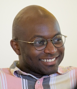 Smiling young man wearing striped shirt