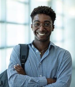 Man wearing glasses in checked shirt