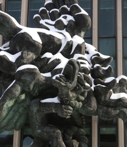 The Bellerophon Taming Pegasus statue is covered in winter snow.