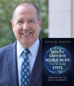 Man in tie and jacket with book cover