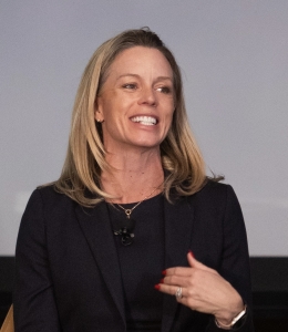 Woman in black blazer and shirt