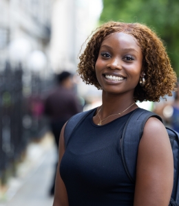 Woman outdoors in sleeveless shirt