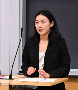 Alice Park stands behind a podium.