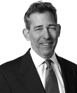 Pictured above is a black and white image of Steven G. Horowitz in a suit and tie.