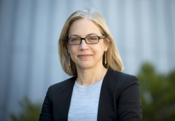Columbia Law Professor Gillian Metzger in glasses and a blazer on the Columbia University campus