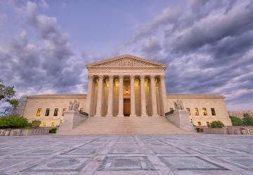 Photo of the U.S. Supreme Court Building at dusk