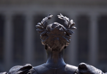 The back side of Alma Mater's head and crown