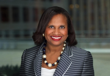 New York City Bar president Sheila Boston in a striped blazer and chunky necklace