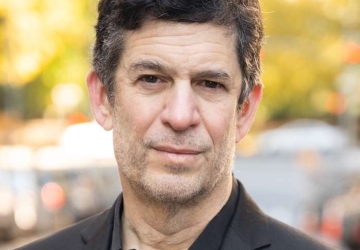 Columbia Law Professor Michael Heller in dark shirt and blazer