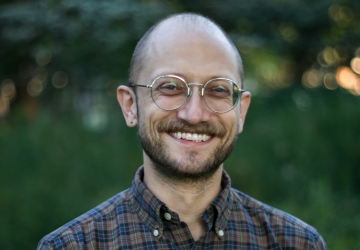 Man in glasses and plaid shirt