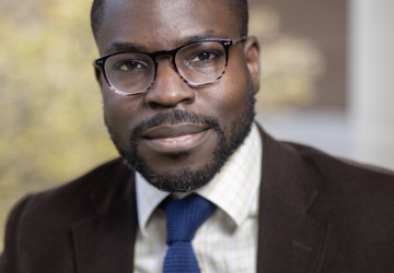 Man in glasses and suit and tie