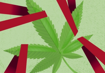 A marijuana leaf wrapped in red tape