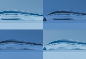 four side views of book pages