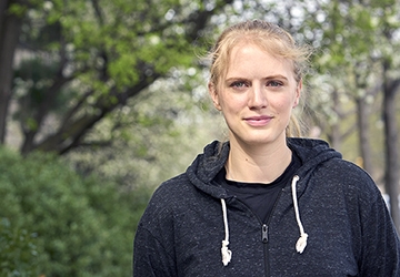 Woman wearing a black hoodie