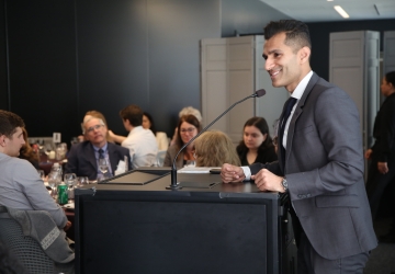 Man standing at a podium