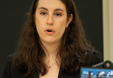 Julia Konstantinovsky speaking at HFS Moot Court semi-finals