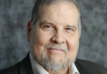 Man with beard in suit jacket