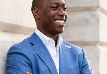 Man in blue jacket and white shirt