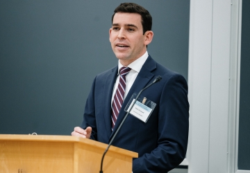 Man standing at a podium