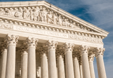The facade of the U.S. Supreme Court building with “Equal Justice Under the Law“ visible at the top